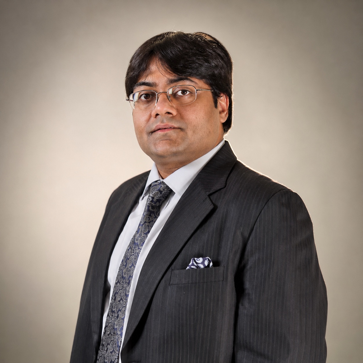 Mr. Abhishek Poddar, Director
